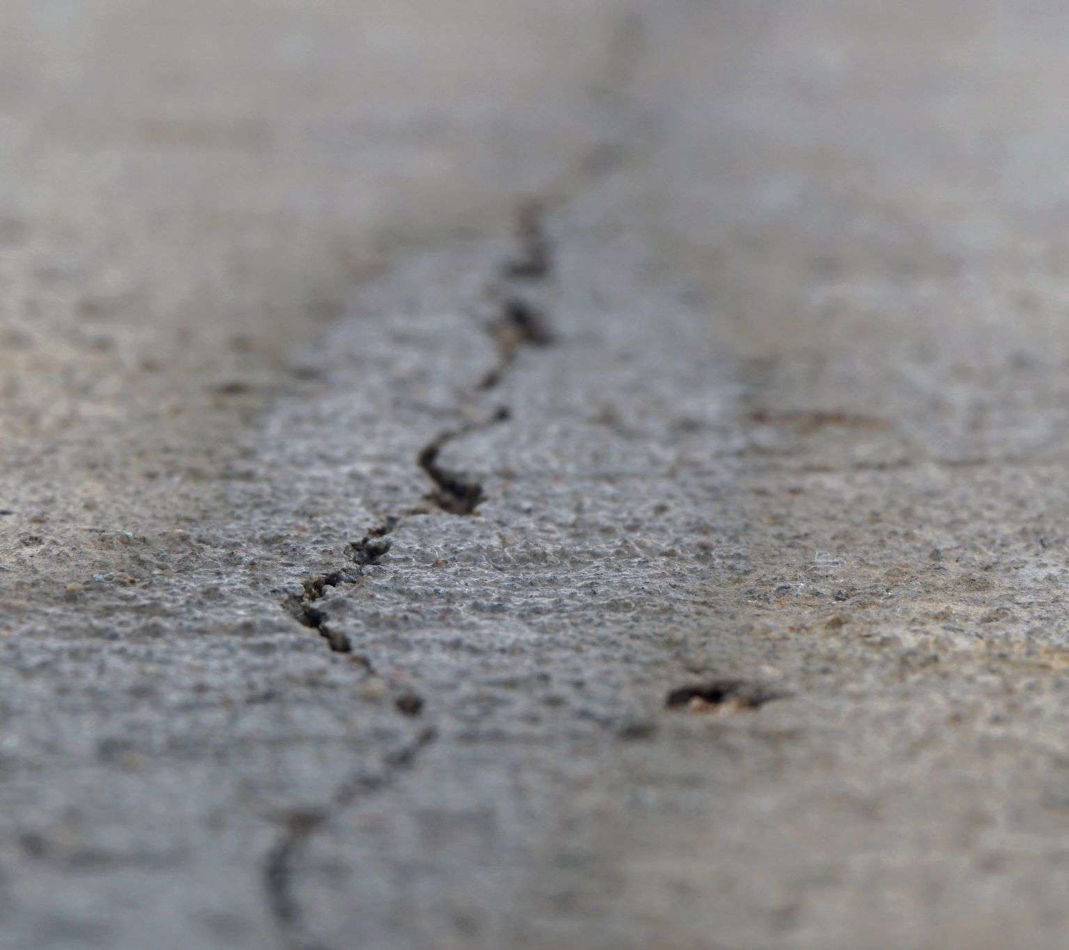 cracked and separating concrete
