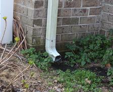 Exterior gutter and downspout.