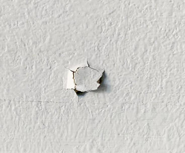 Nail pip in drywall.