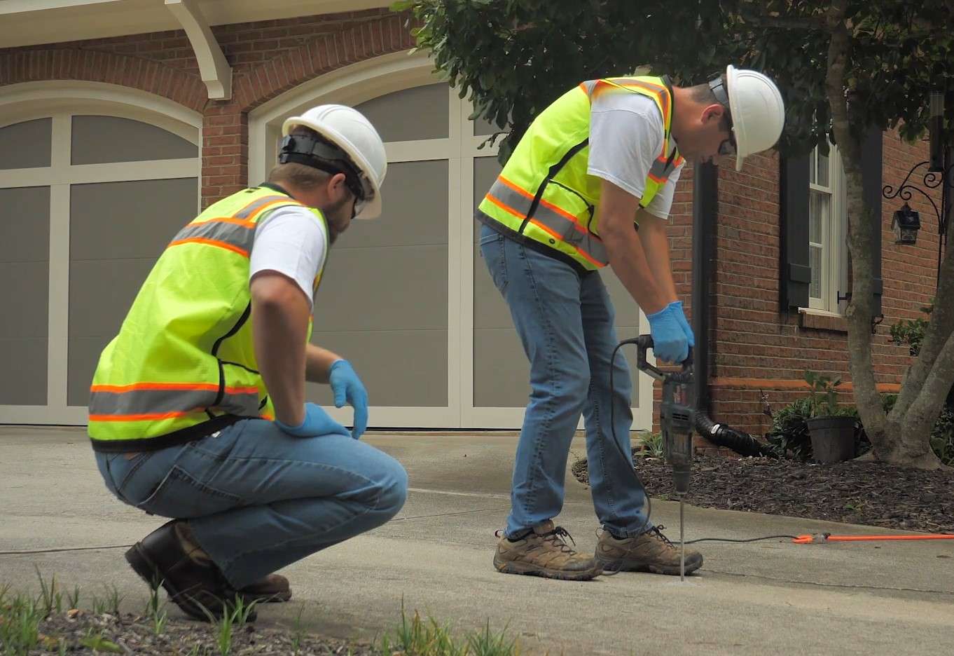 JES Foundation Repair crew installing polyrenewal to sinking concrete slab