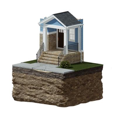 Cross-section of a small blue house with a porch, brick foundation, and surrounding grass on a soil platform.