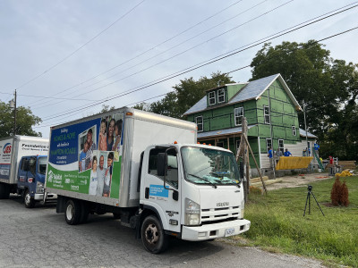 JES and Habitat for Humanity Trucks at the project site.