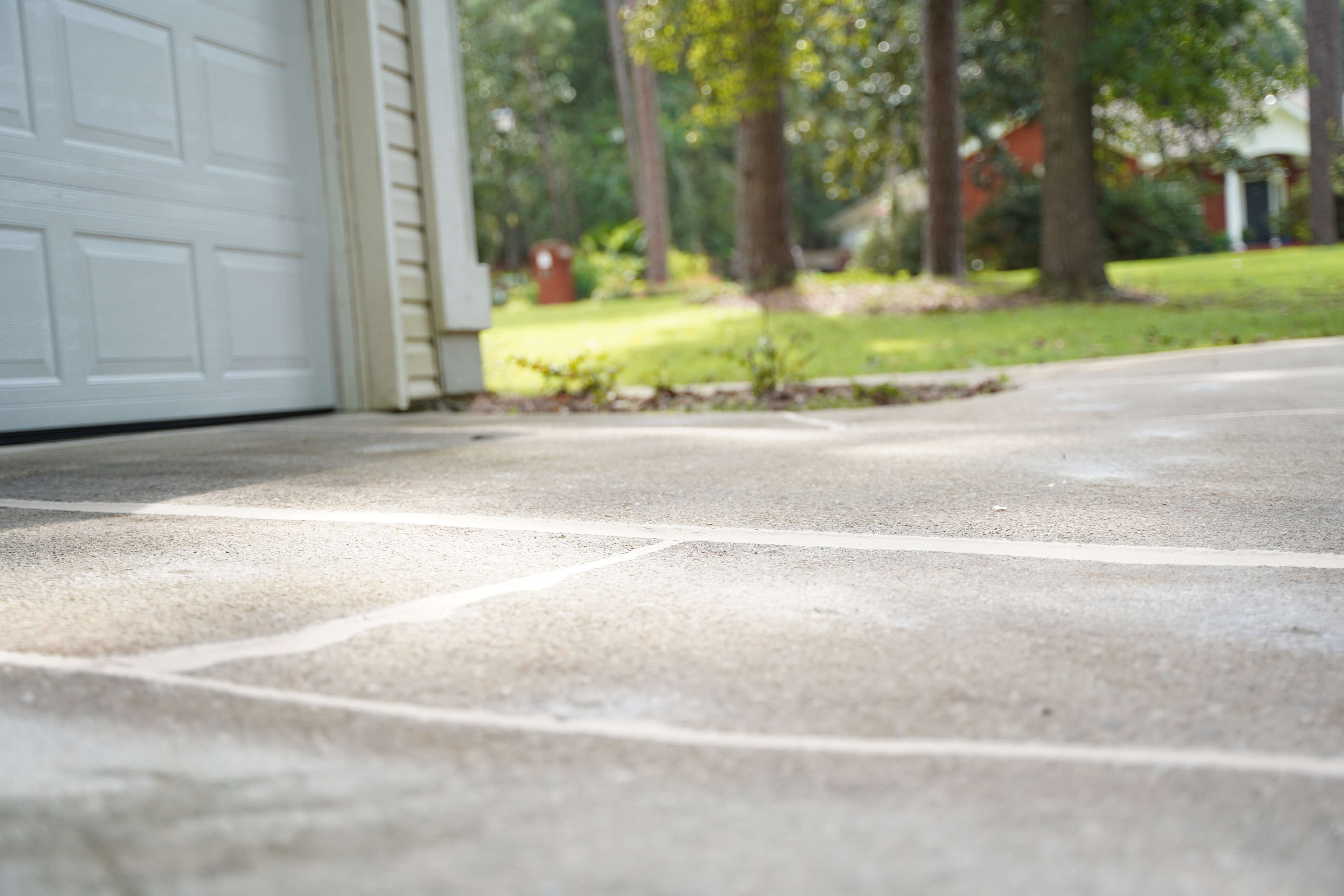 concrete driveway lifted and repaired by polyrenewal polyurethane foam
