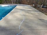 concrete crack repair near a swimming pool