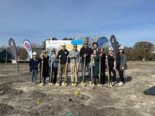 JES Foundation Repair crew standing with shovels at St. Jude Dream Home location.
