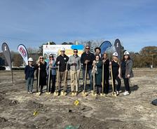 JES Foundation Repair crew standing with shovels at St. Jude Dream Home location.