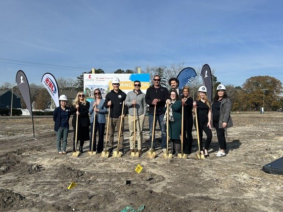 JES Foundation Repair crew standing with shovels at St. Jude Dream Home location.