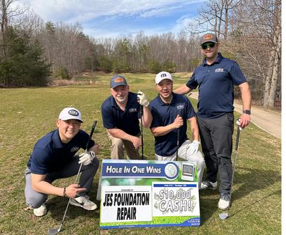 Four JES Foundation Repair team members at 2025 Frostbite Scramble sponsorship Prince William Chamber of Commerce event