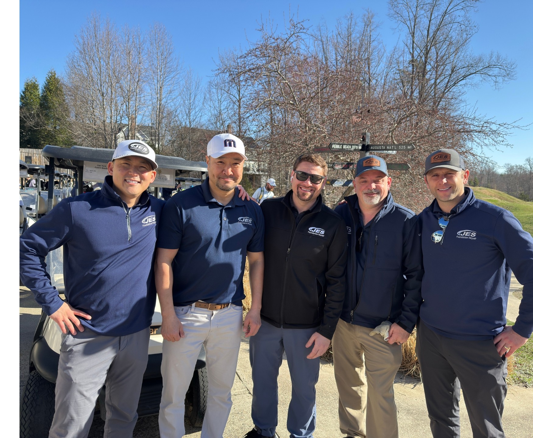 Five JES Foundation Repair team members at 2025 Frostbite Scramble sponsorship Prince William Chamber of Commerce event