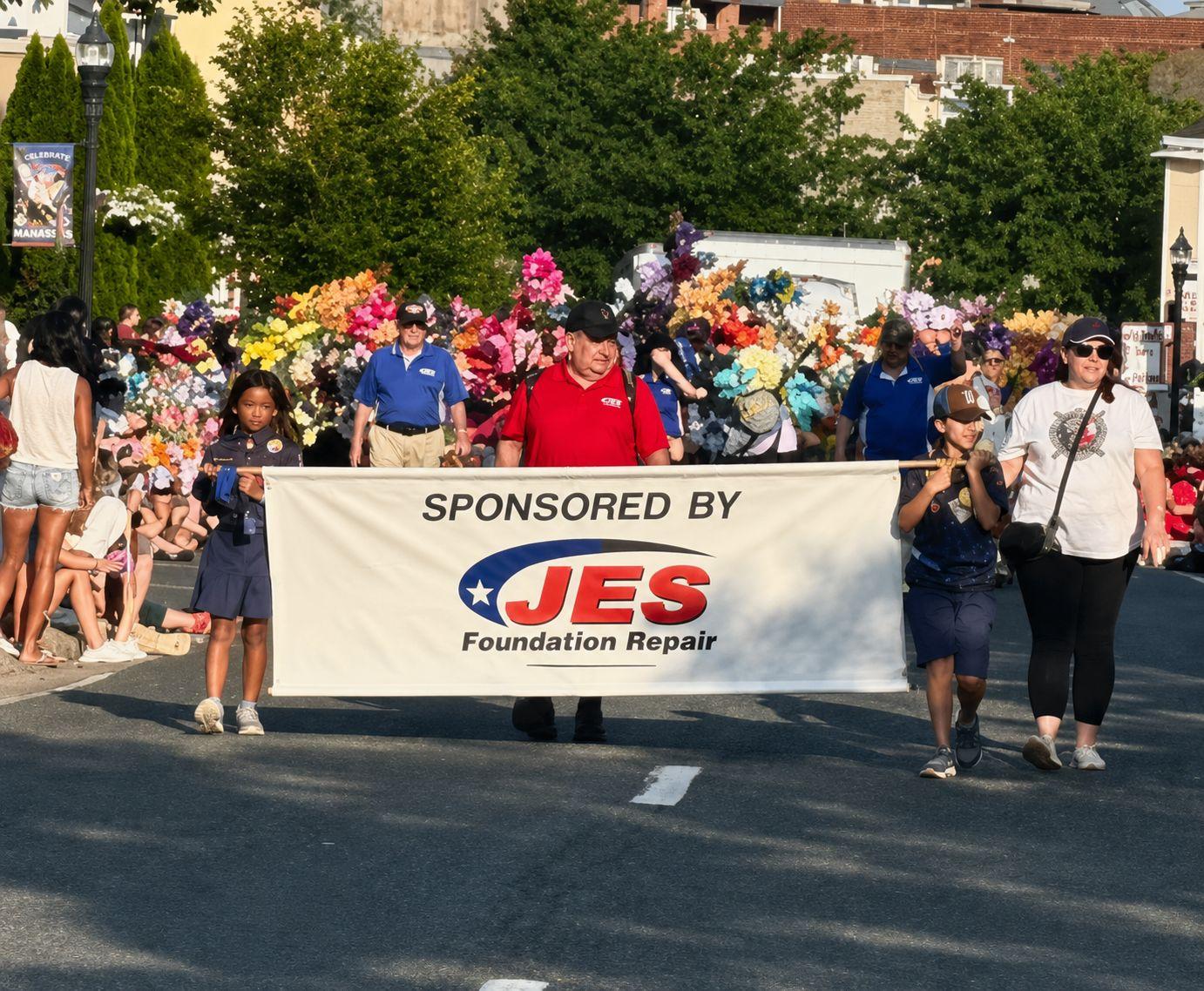 JES employees march in the 2025 Bel Air Independence Day Parade