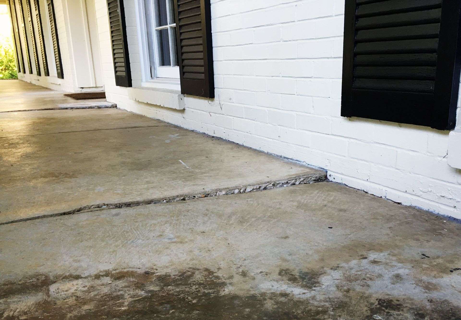 cracking and sinking concrete patio