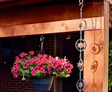 copper gutters with flowers