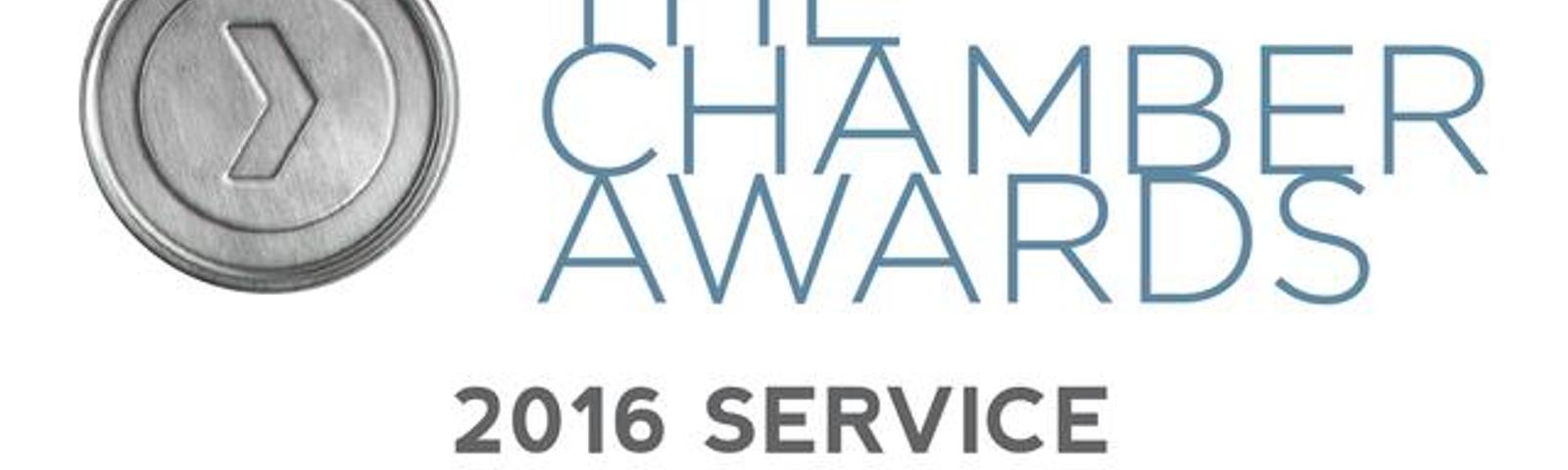 Award logo for "The Chamber Awards: 2016 Service Business of the Year" with a circular emblem on the left.