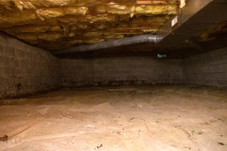 Crawl space before encapsulation.