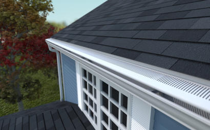 White gutters on blue home.