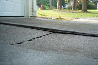 Concrete driveway before leveling and lifting