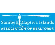 Logo with a white lighthouse, "Sanibel Captiva Islands ASSOCIATION OF REALTORS®" on a blue background.