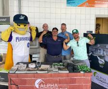 Alpha Foundations table at a Fort Myers Mighty Mussels game