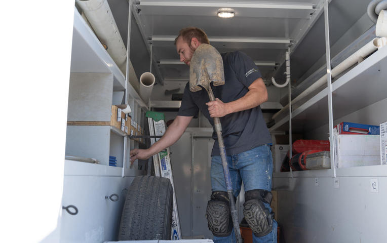 BAWV crew member in truck.