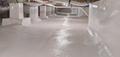 Clean, sealed crawl space with white plastic sheeting on the floor and walls, and visible ductwork above.