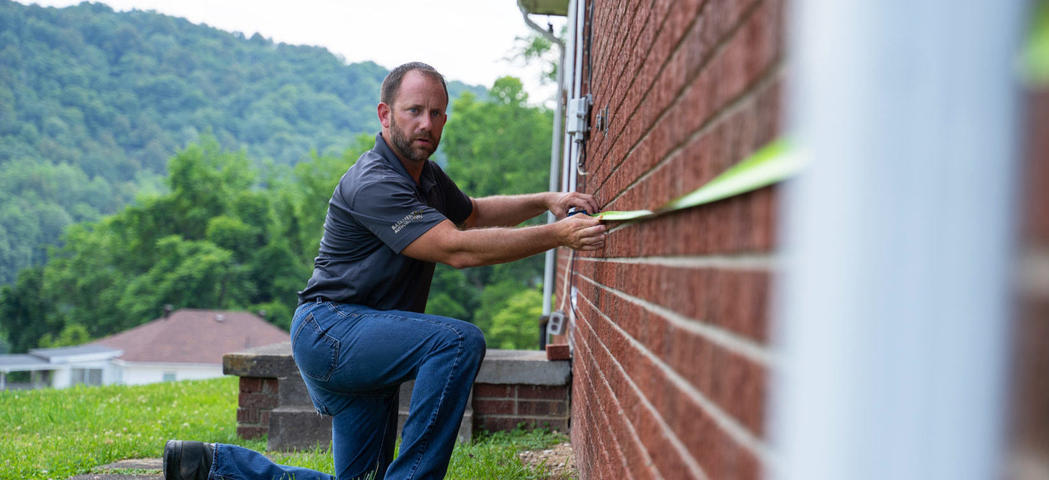 BAWV CFI measuring home exterior