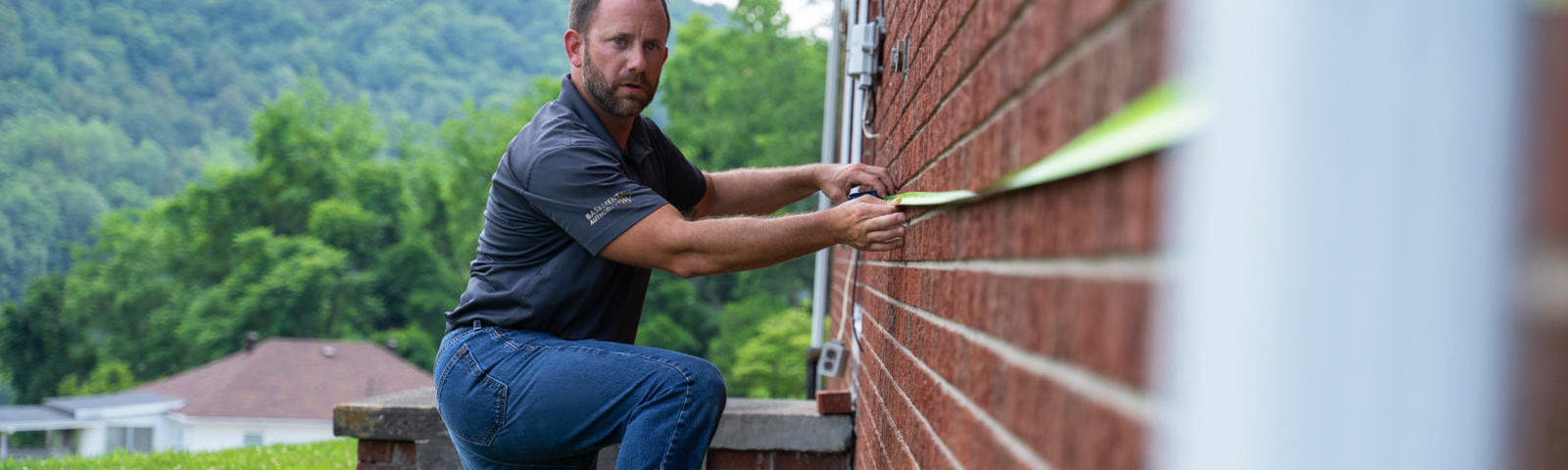 BAWV CFI measuring home exterior
