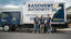 BAWV crew members standing in front of BAWV box truck.