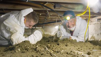 Mike helps the groundworks team clear out a basement