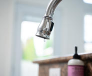 Leaky faucet close-up.