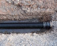 Buried Sewer Line in Road Construction Watermain Tubing Piping Water Infastructure Plumbing