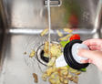 Drain clogged with food and running water