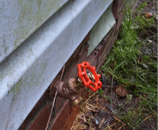 Rusty hose bib outside the home