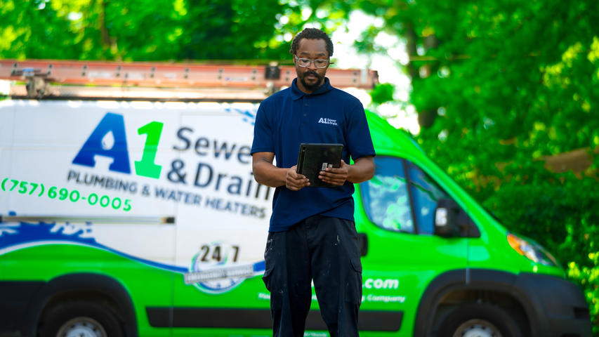 A1 Technician with van outside.