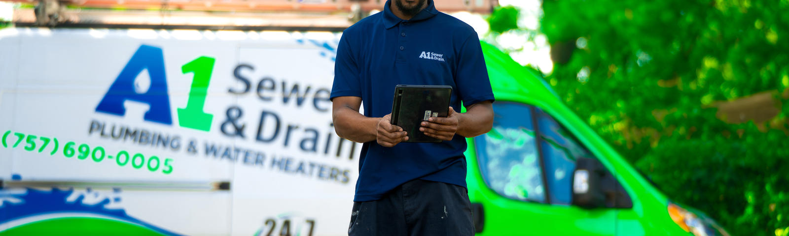 A1 Technician with van outside.