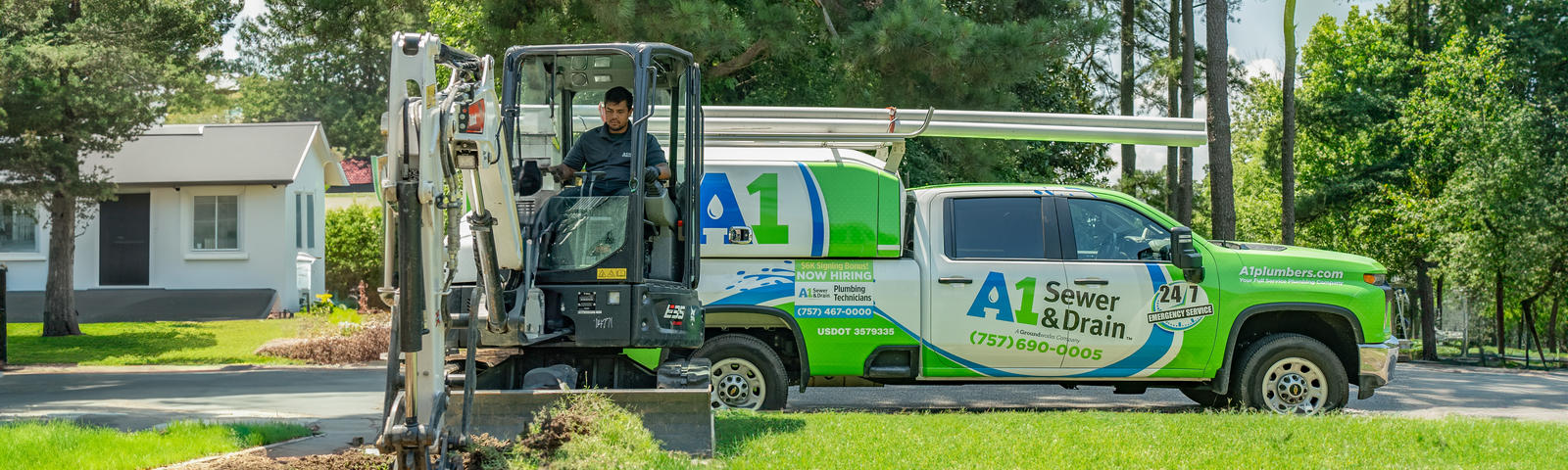 A1 Technician digging in front yard with A1 truck in the background.