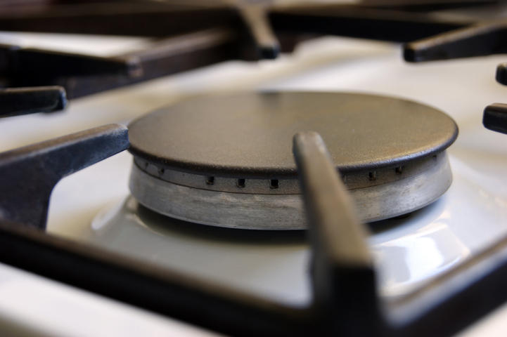 A close up of the gas stove burner.