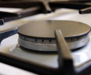 A close up of the gas stove burner.