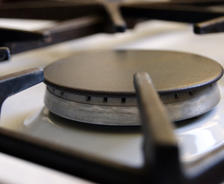 A close up of the gas stove burner.