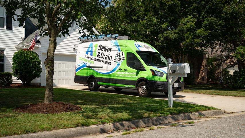 A1 van in driveway of customer's home.