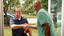 CFI greeting homeowner at the front door.