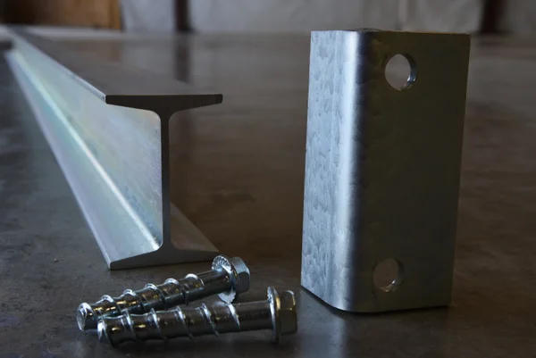 metal beam, metal hinge and screws