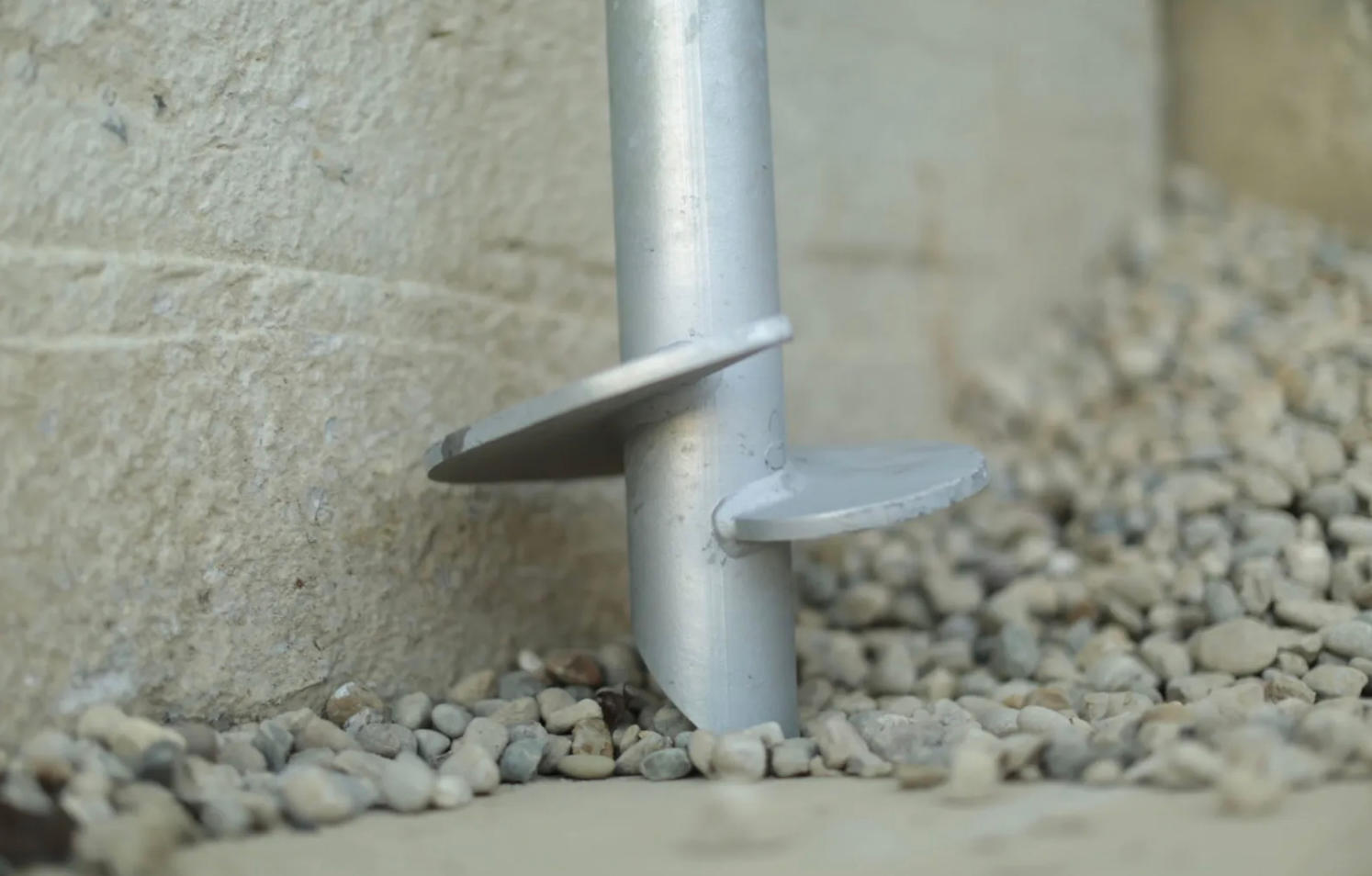 Helical piers installation process.