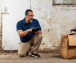 A Groundworks worker inspecting a basement.