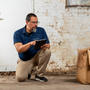 A Groundworks worker inspecting a basement.
