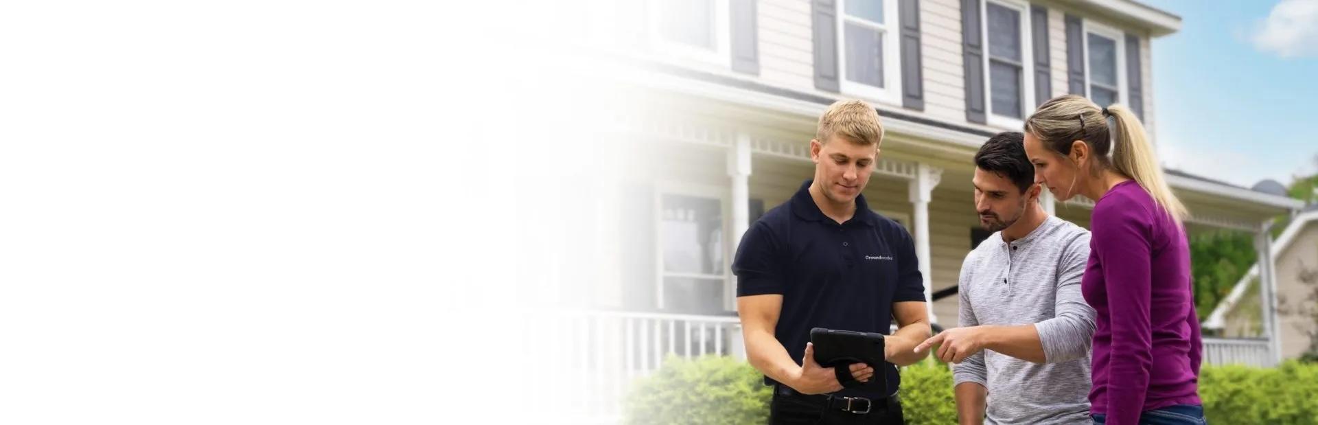 inspector showing customers his tablet