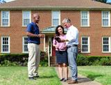 CFI outside with homeowners
