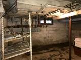 A leaking bowing basement wall.
