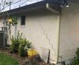 Cracks on the exterior foundation wall.