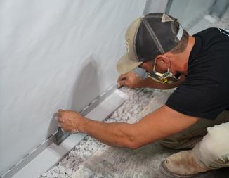installing interior drainage in basement
