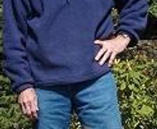 the owner, Pete Burgesswith his golden retriever